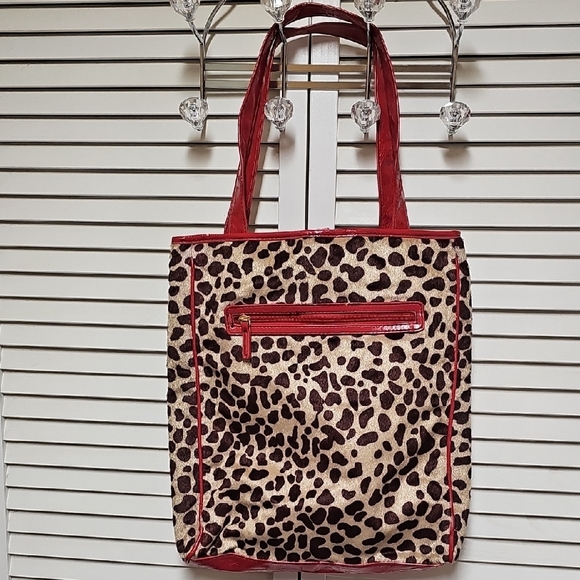Bath & Body Works Handbags - Vintage Bath & Body Works Leopard Tote with Red Trim And Red Satin Lining